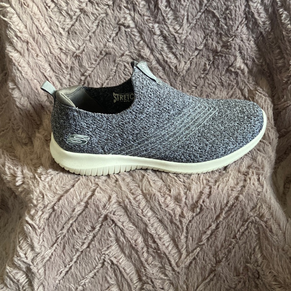 Sketchers air cooled memory foam stretch fit sneakers.